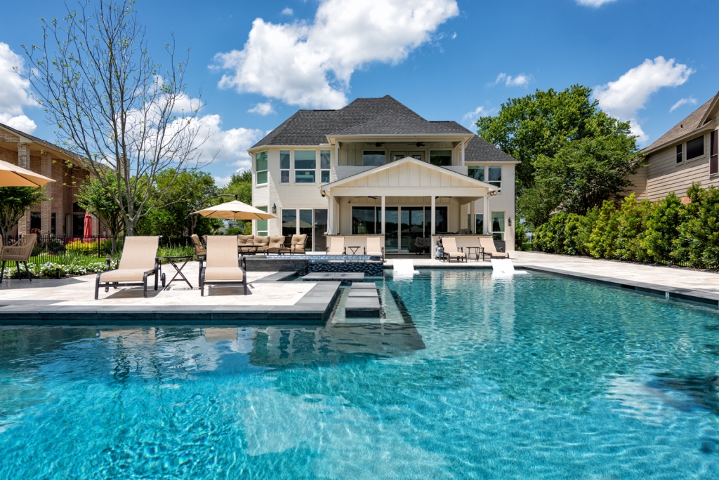 swimming pool next to house