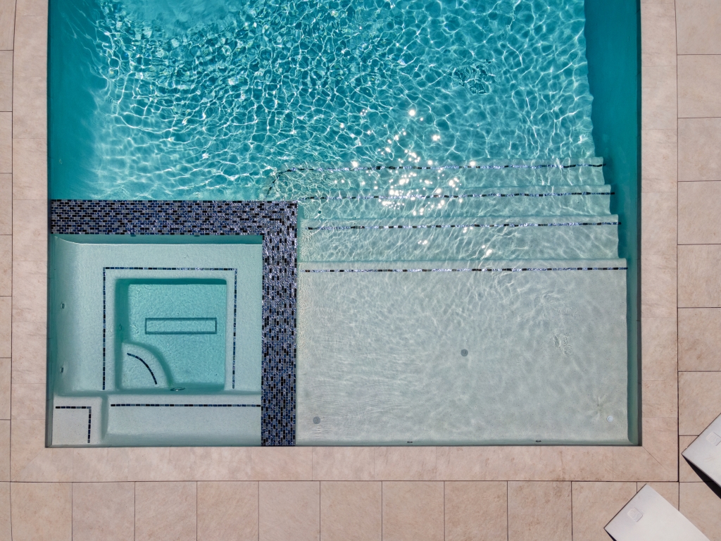 an aerial view of a square swimming pool